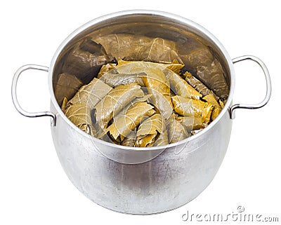 Dolma from grape leaves and mince in stewpan Stock Photo