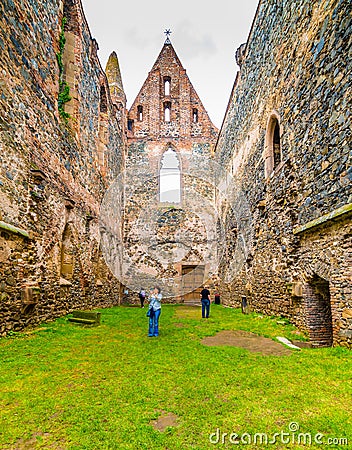 Dolni Kounice, Czech Republic - 6.7.2020: Tourists are visiting the Rosa Coeli monastery. Old ruined woman monastery is built in Editorial Stock Photo