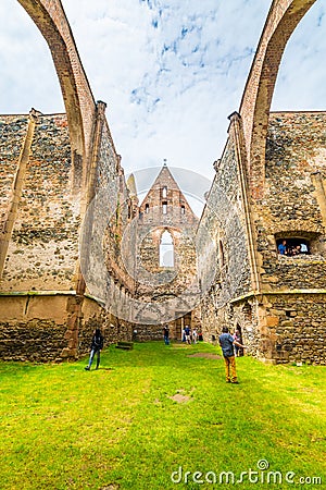 Dolni Kounice, Czech Republic - 6.7.2020: Tourists are visiting the Rosa Coeli monastery. Old ruined woman monastery is built in Editorial Stock Photo