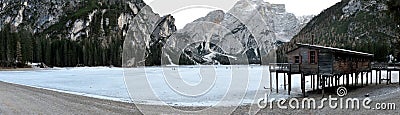 Dolomite Braies lake iced panorama Stock Photo