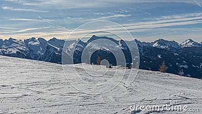 Dolomites, ski area with beautiful slopes. Empty ski slope in winter on a sunny day. Prepare ski slope, Alpe di Lusia, Italy Stock Photo