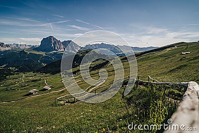 Dolomiti landscape with hiking path and Sasolungo mountian. Stock Photo