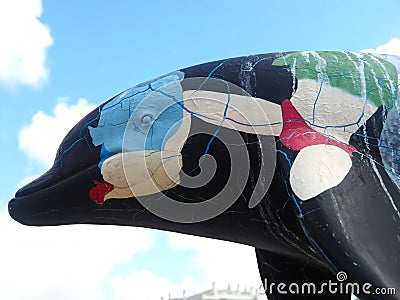 Dolphin sculpture in Setubal Portugal of the exhibition named Golfinho Colorido Editorial Stock Photo