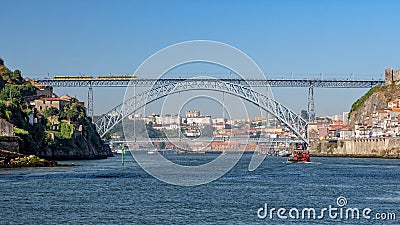 Dom Luis 1 Bridge, Ponte de Dom Luis I, as viewed from the river, Porto, Portugal. Editorial Stock Photo