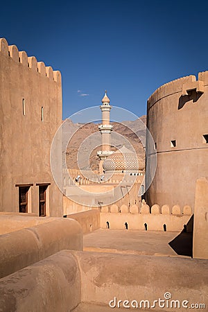 Dome and minaret of historic Nizwa, Oman. Editorial Stock Photo