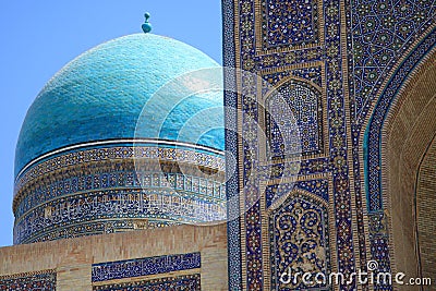 The dome and portal of a Koranic school in Bukhara Stock Photo