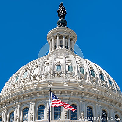 Dome of the Us Capitol at Washington with a United States Flag Stock Photo