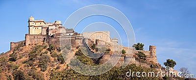 Domed tower and fortified wall of Kumbhalgarh Fortress near Udaipur, India Stock Photo