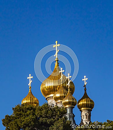 Domes of Orthodox Church of Mary Magdalene at Olives Mount of Jerusalem, Israel at the background of blue sky Stock Photo