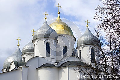 The domes of St. Sophia Cathedral closeup on the background of cloudy sky. Veliky Novgorod Stock Photo