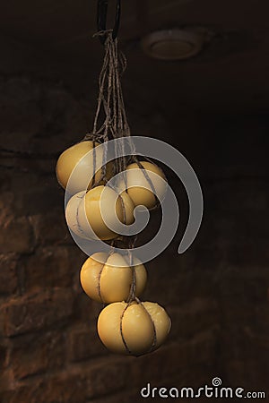 Domestic cheese ripening produced Stock Photo