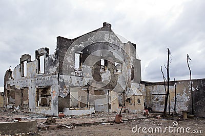 Domestic house destroyed by fire Stock Photo