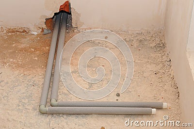 Domestic plumbing pipes connections for heating radiator Stock Photo