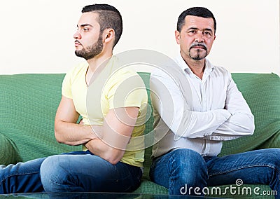 Domestic quarrel between men Stock Photo