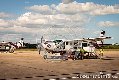 Domestic Tropic Air airline getting ready for passengers at Philip S. W. Goldson Airport in Belize City, Belize Editorial Stock Photo