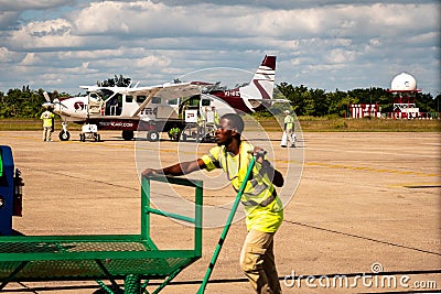 Domestic Tropic Air airline getting ready for passengers at Philip S. W. Goldson Airport in Belize City, Belize Editorial Stock Photo