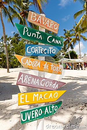 07.24.2022. Dominican Republic Bavaro Punta cana provinces La Altagracia. Wooden pillar with signposts directions Stock Photo