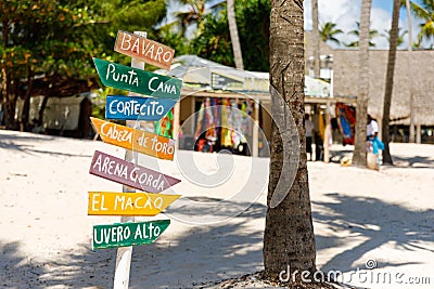 Dominican Republic Bavaro Punta cana provinces La Altagracia. Wooden pillar with signposts directions Stock Photo