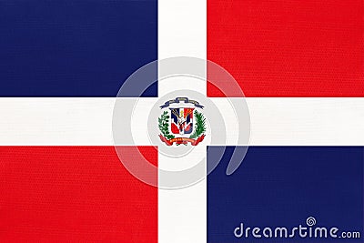 Dominican republic national fabric flag textile background. Symbol of world north America country Stock Photo