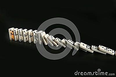 Domino game business metaphor Stock Photo