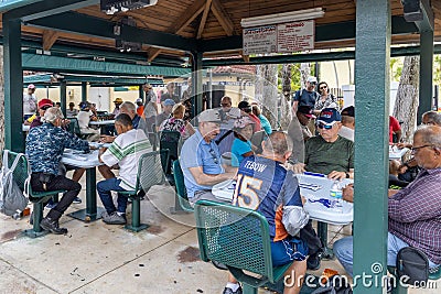 The Domino Park is a popular tourist destination in Little Havana to watch the elderly play domino. Editorial Stock Photo