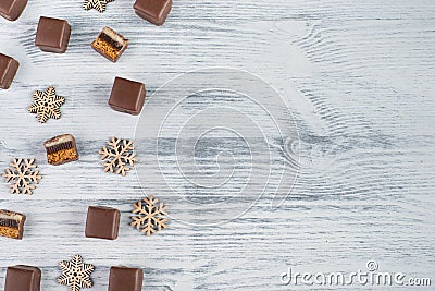 Domino stones, a german traditional christmas sweet with gingerbread, marzipan and jelly covered with brown chocolate, Dominostein Stock Photo