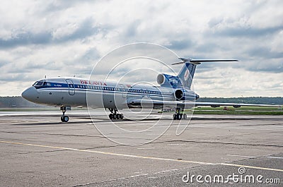Domodedovo airport, Moscow - July 11th, 2015: Tupolev Tu-154M EW-85748 of Belavia Airlines Editorial Stock Photo