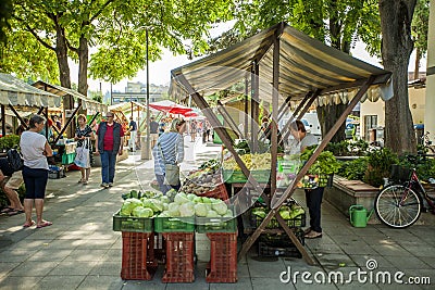 DOMZALE, SLOVENIA - Jul 15, 2019: Sunny Saturday morning at farmer's market Editorial Stock Photo