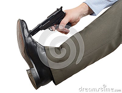 Don't shoot yourself in the foot Stock Photo