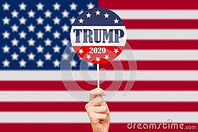 Donald Trump campaign button on the background of the USA flag. Election of the President of the United States of America Editorial Stock Photo