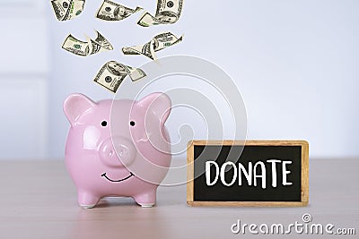 DONATE concept giving and donation Charity Give Help Stock Photo