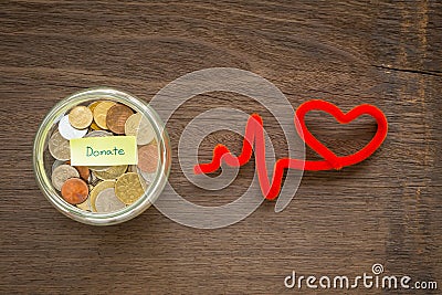 Donate money to heart charity Stock Photo