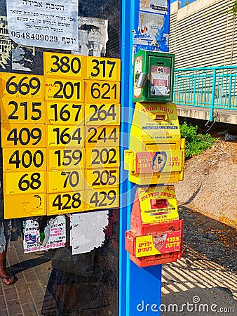 Donation boxes installed on the bus stop shelter in Tel Aviv Editorial Stock Photo