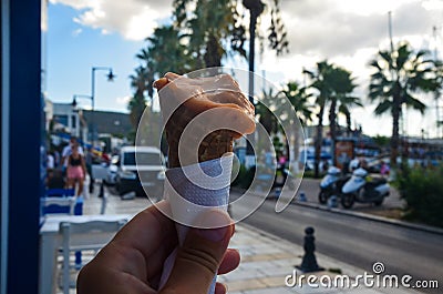 Dondurma - Popular Turkish traditional ice-cream. Women hand over a cone of ice-cream Stock Photo