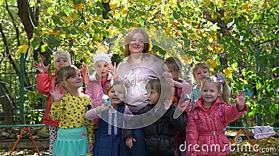 Donetsk, Ukraine - October 3, 2019. Preschool kids with teacher on a walk Editorial Stock Photo