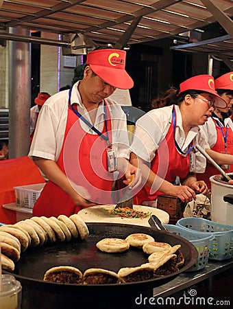 Donghuamen night food market in Beijing: Bread Editorial Stock Photo