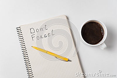 Dont forget written on notebook over white background. Morning coffee and plans Stock Photo