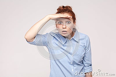 Dont see. Where are you? Emotional foxy woman looking at camera Stock Photo