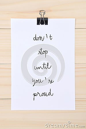 Dont stop until you re proud on white paper Stock Photo