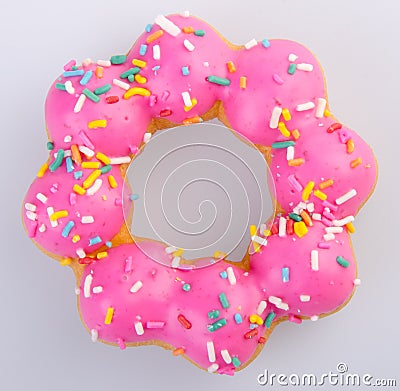 Donut, fresh delicious pink donut on a background. Stock Photo