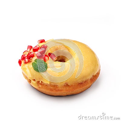 Donut glazed with honey and pomegranate. View from a forty-five degree angle. Isolated image Stock Photo