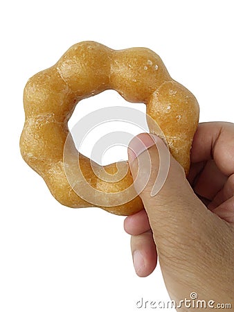 Donut in man`s hand isolated on white background Stock Photo