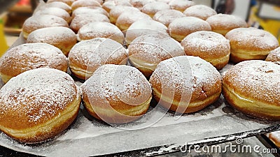 Donuts Sufganiyah or Sufganiyot for Jewish holiday Hanukkah or Hanuka in Hebrew. Sufganiyah - donuts in israel Stock Photo