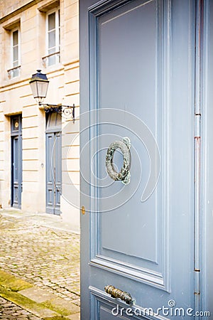 Door of bordeaux French historical building bronze knocker on wooden door Stock Photo