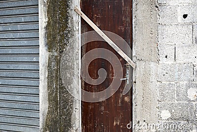 Door gate wall brick plaster Stock Photo