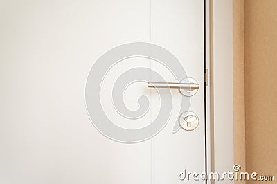 White door with handle and deadlock Stock Photo