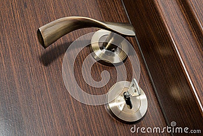 Door handle, door lock and key Stock Photo