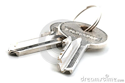 Door keys on white bacglround - close up Stock Photo