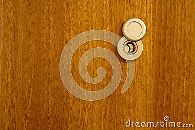 Door lens in the wooden background Stock Photo