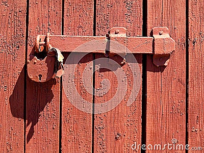 Door lock for key closing, keyhole, hasp bolt. Collection of old vintage retro locks on the textured colored door. Close-up Stock Photo
